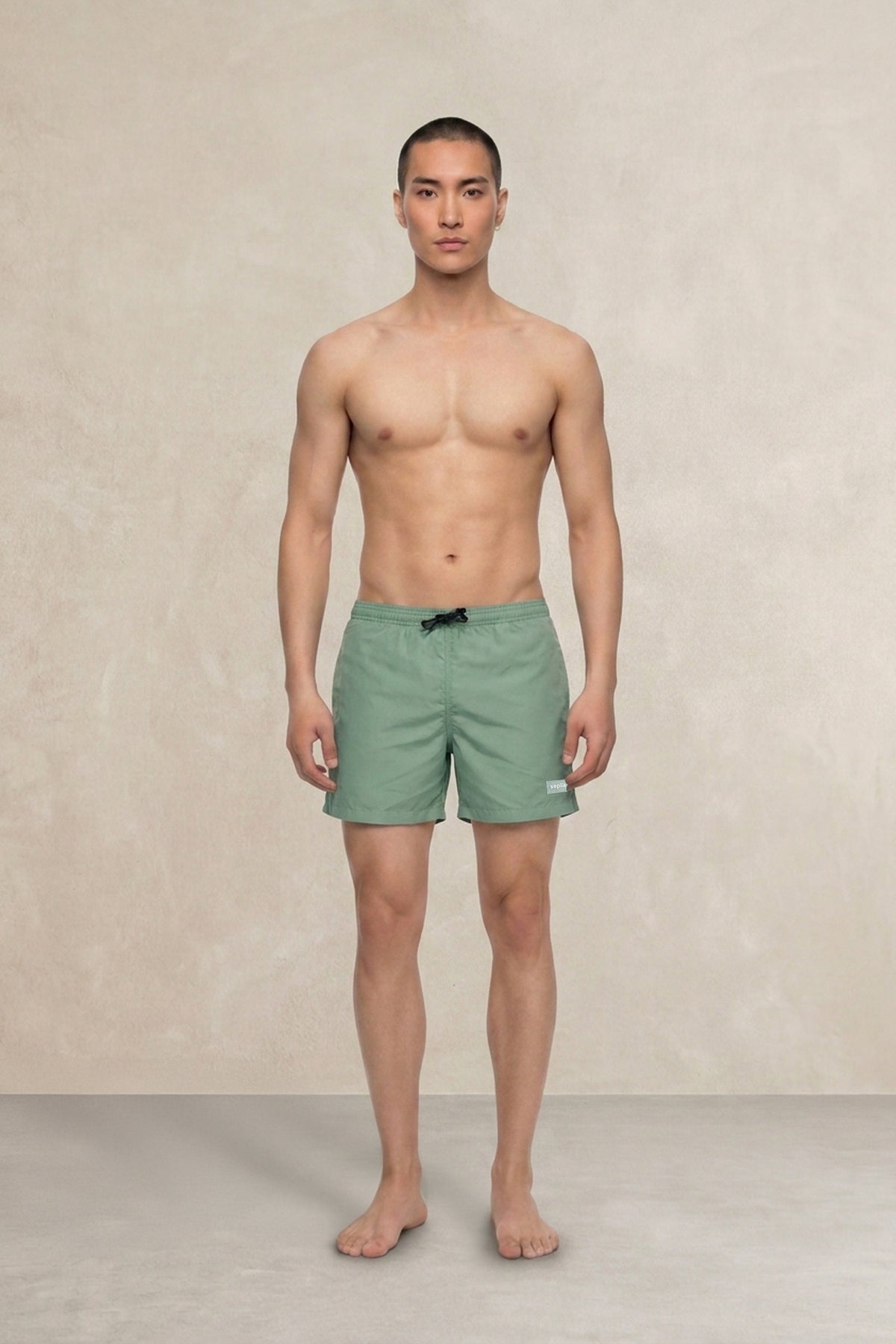 Green swim shorts