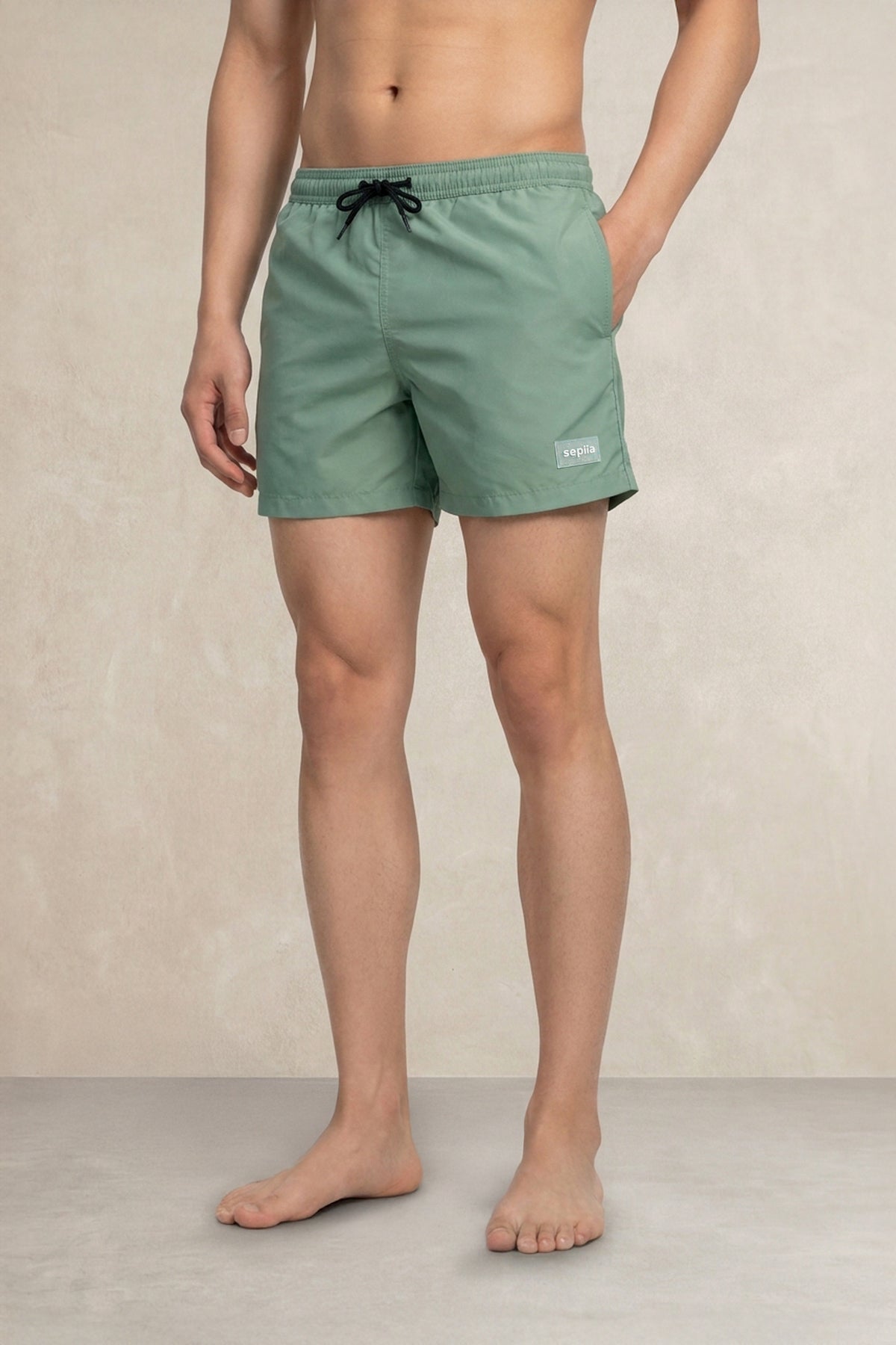 Green swim shorts