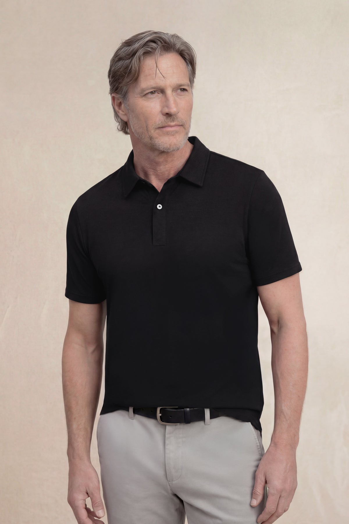 Polo manga corta hombre negro plano frontal